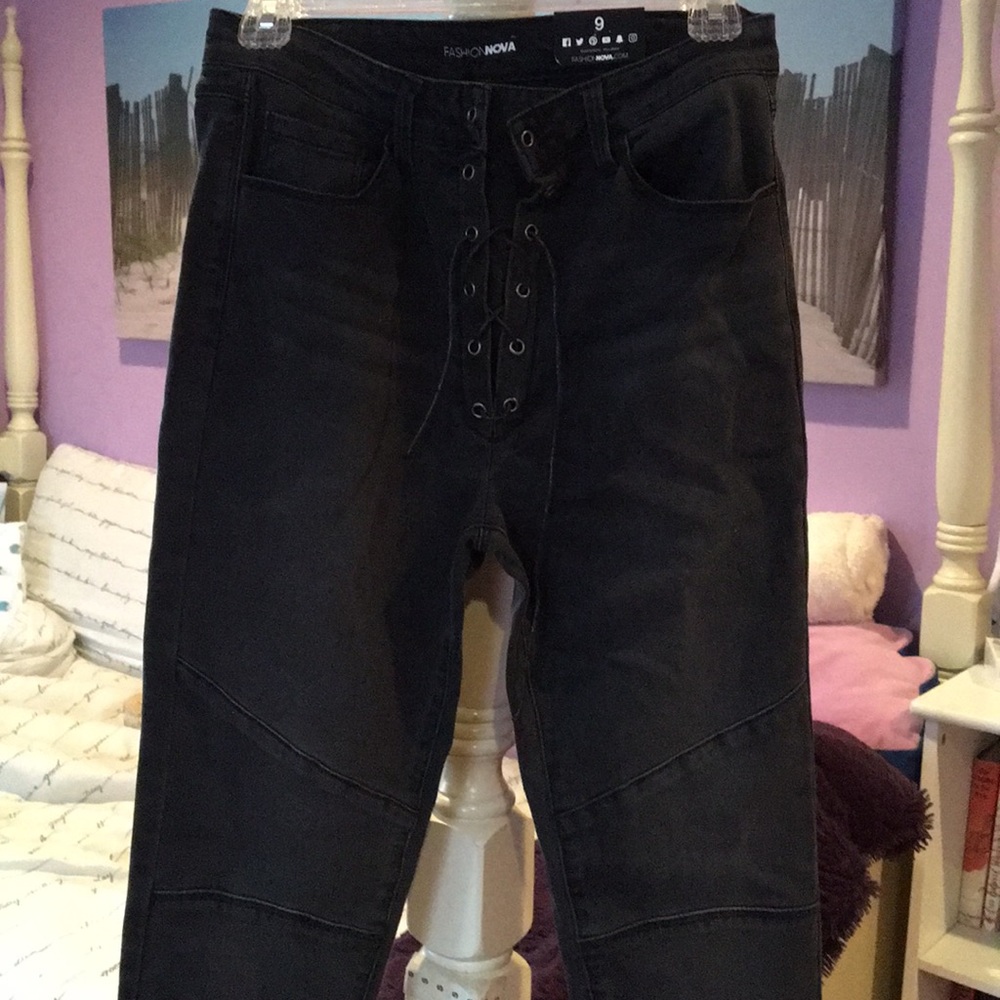 Hi-rise lace up Fashion Nova skinny jeans.